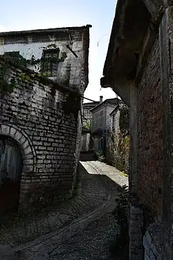 Street with stone houses in Derviçan.