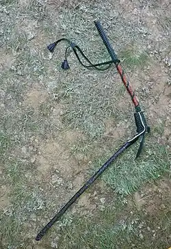 A kind of Kalmyk nagaika with a uniformly tightly woven, almost unbending leather whip without tapering to the tip