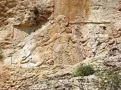 Rock relief at Sar Mashhad, showing Bahram II slaying two lions