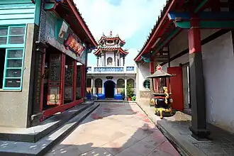 The bell tower in the west inner side.