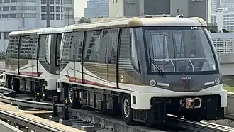 Bombardier Innovia APM 300 vehicle approaching Khlong San station