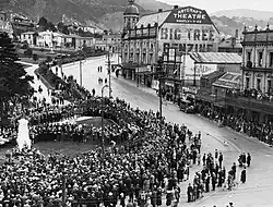 Photo of crowds around a memorial