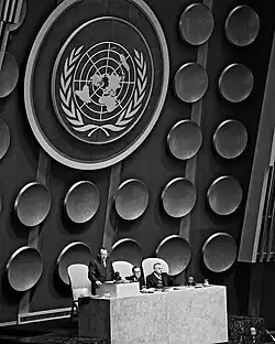 Escutcheons in the UNGA hall intended to be emblazoned with national arms, including France's,[25] but removed in 1956[26][27]