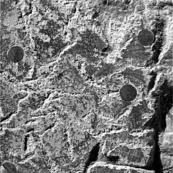 Figure 6. Close-up of sediment matrix and embedded hematite spherules abraded by Opportunitys Rock Abrasion Tool. This Eagle Crater image covers an approximate 32 mm x 32 mm area. It was taken on Sol 34 (2004-02-29).