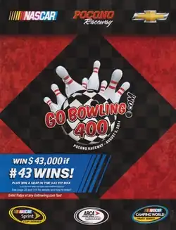 The 2014 Gobowling.com 400 program cover. The program featured an advertisement that featured a giveaway of $43,000 if Aric Almirola won.