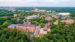 Aerial view of Bethany Lutheran College campus, with Mayo Clinic Mankato Hospital and Madison Avenue visible in the background.
