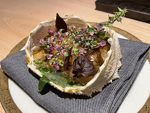 Crab dish served in shell.