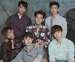 2PM in 2015 Clockwise from top to bottom: Chansung, Taecyeon, Wooyoung, Junho, Nichkhun, and Jun. K