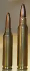 4.6x36mm cartridge next to a .223 Remington cartridge.