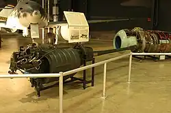 German BK 5 50 mm aircraft autocannon displayed in front of the Me 262A jet, a design once tested with it