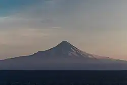 Shishaldin (9,373 ft; 2,857 m) volcano as seen from the Unimak Pass in the morning light.