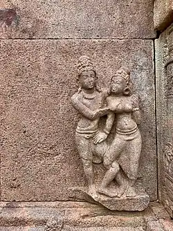 Amorous couple, kama scene on outer wall
