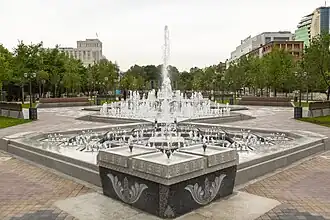 Fountains with granite-clad basins