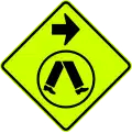 (W6-V2-2) Pedestrian Crossing Ahead on Side Road (turn right) (used in Victoria)