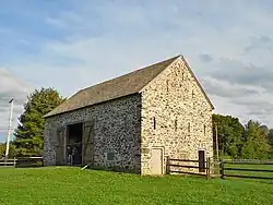 Abidiah Taylor Barn Chester County, Pennsylvania. Part of the Taylor-Cope Historic District. Built in either 1724 (date stone) or 1744 (wooden beam investigation), it is one of the oldest extant barns in the United States. Field stone walls.