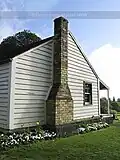Acacia Cottage, exterior, with brick chimney.