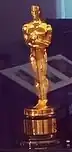 An "Academy award of merit statuette", popularly known as "The Oscars statuette"