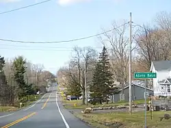 The hamlet of Adams Basin along CR 212