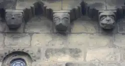 The corbel frieze and round Romanesque window