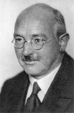 Image 69German physicist Albert Betz had a crucial role in the development of wind turbine technology. Betz's law states that no wind turbine can capture more than 59.3% of the wind's kinetic energy. (from Wind turbine)