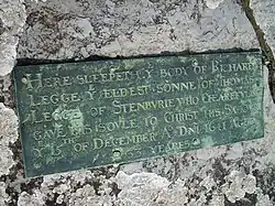 A plaque for a church with 1641 on it.