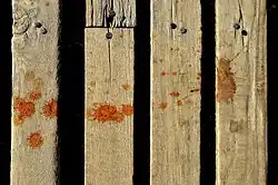Red betel quid spit on a bridge in Mandalay