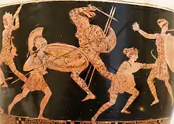 A Greek hoplite, centre, with spear and shield, surrounded by sword- and bow-wielding female Amazons.