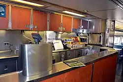 Stainless steel counter with stacked food items