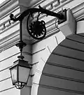 Closeup of one of the lanterns on the arches.