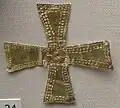 Gold cross, which indicates that the person buried was Christian