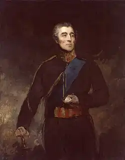 Elderly man in a military uniform, holding a sword