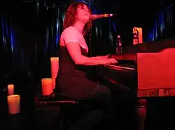 Aslyn performing in 2006