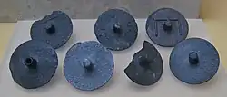 Ancient Greek bronze secret ballots used to cast a juror's vote on a case, 3rd century BC, Ancient Agora Museum in Athens, housed in the Stoa of Attalus