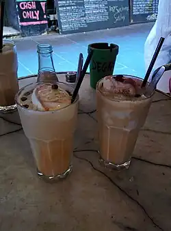 Image 7Australian iced coffee served with ice-cream and coffee beans (from List of national drinks)