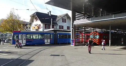 Two-story building with a tram