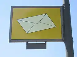 Yellow sign depicting an envelope
