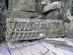 Fallen lintel showing the Churning of the Sea of Milk.