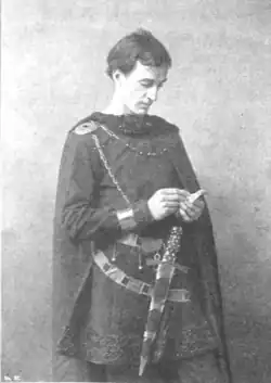 young clean shaven white man in 16th century costume