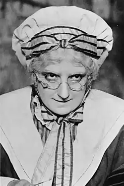 woman in costume as an old villager