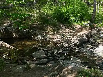 The B trail crosses a small stream