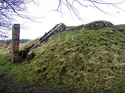 World War II bombing decoy complex, anti-aircraft obstructions and Beacon Batch round barrow cemetery on Black Down