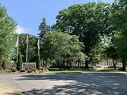 Welcome sign as seen from College Avenue