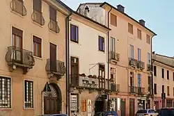 Street view showing early 20th-century residential buildings.