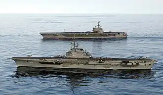 São Paulo (foreground) and USS Ronald Reagan during a combined training exercise in June 2004