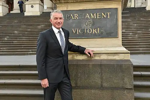 Brian Paynter on the steps of the Parliament of Victoria.jpg