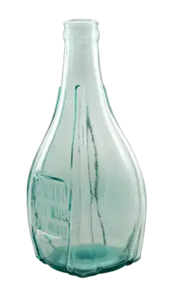 A pale blue glass bottle