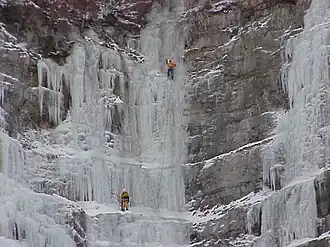 Climbers on the frozen falls, 2003.