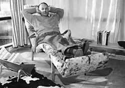 Bruno Mathsson leaning back in an armchair