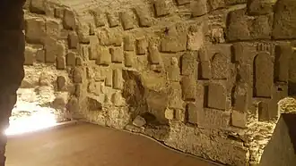 Niches in the "service tunnel" that once held stelae