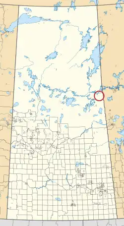 A map of the province of Saskatchewan showing 297 rural municipalities and hundreds of small Indian reserves. One is highlighted with a red circle.